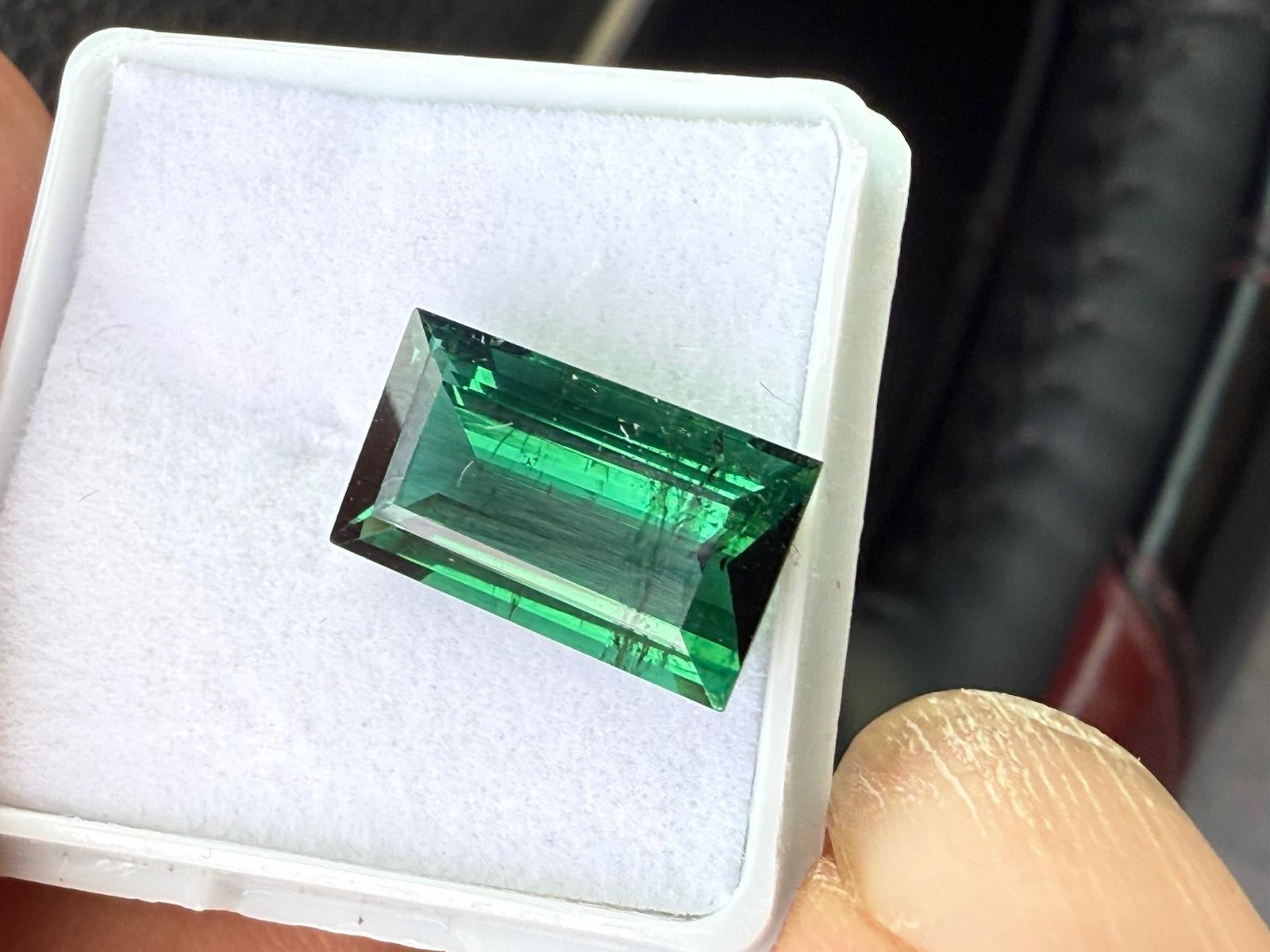 One (1) unmounted rectangular cut.