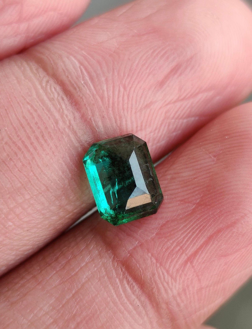 Faceted Green Emerald Octagon Step