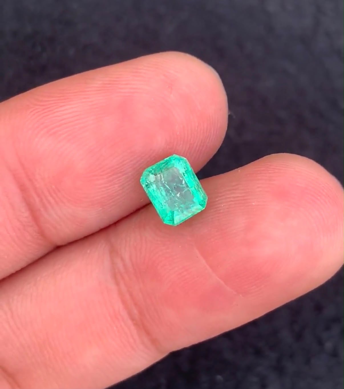 Gemstone: Natural Panjshir Emerald
Weight: 1.16 Carats
Cut: Emerald Cut
Dimensions: 6.34 × 5.06 × 4.71 mm
Origin: Panjshir Valley