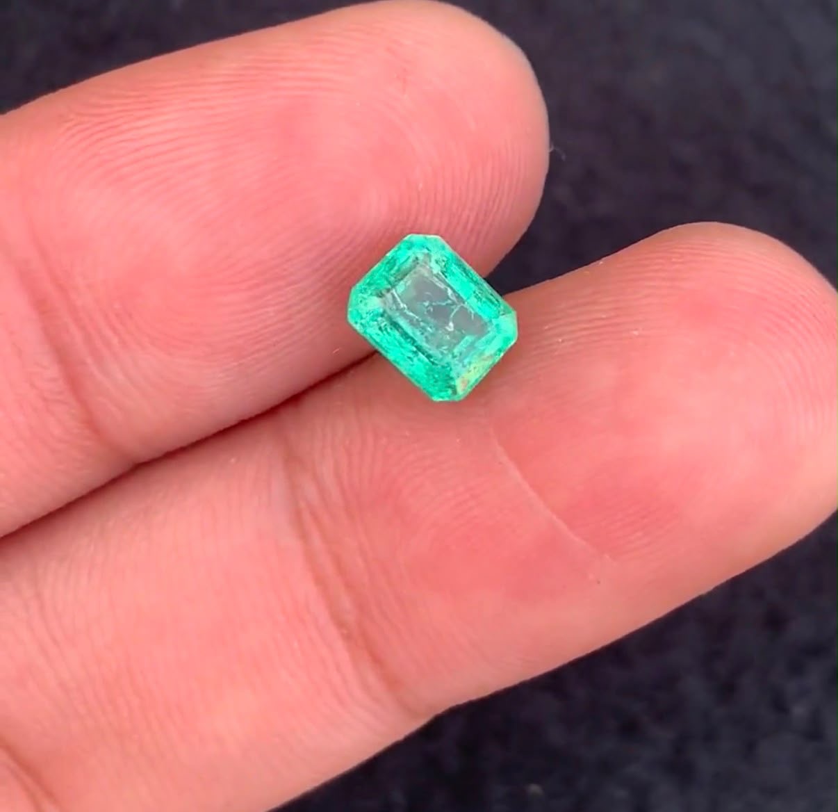 Gemstone: Natural Panjshir Emerald
Weight: 1.16 Carats
Cut: Emerald Cut
Dimensions: 6.34 × 5.06 × 4.71 mm
Origin: Panjshir Valley