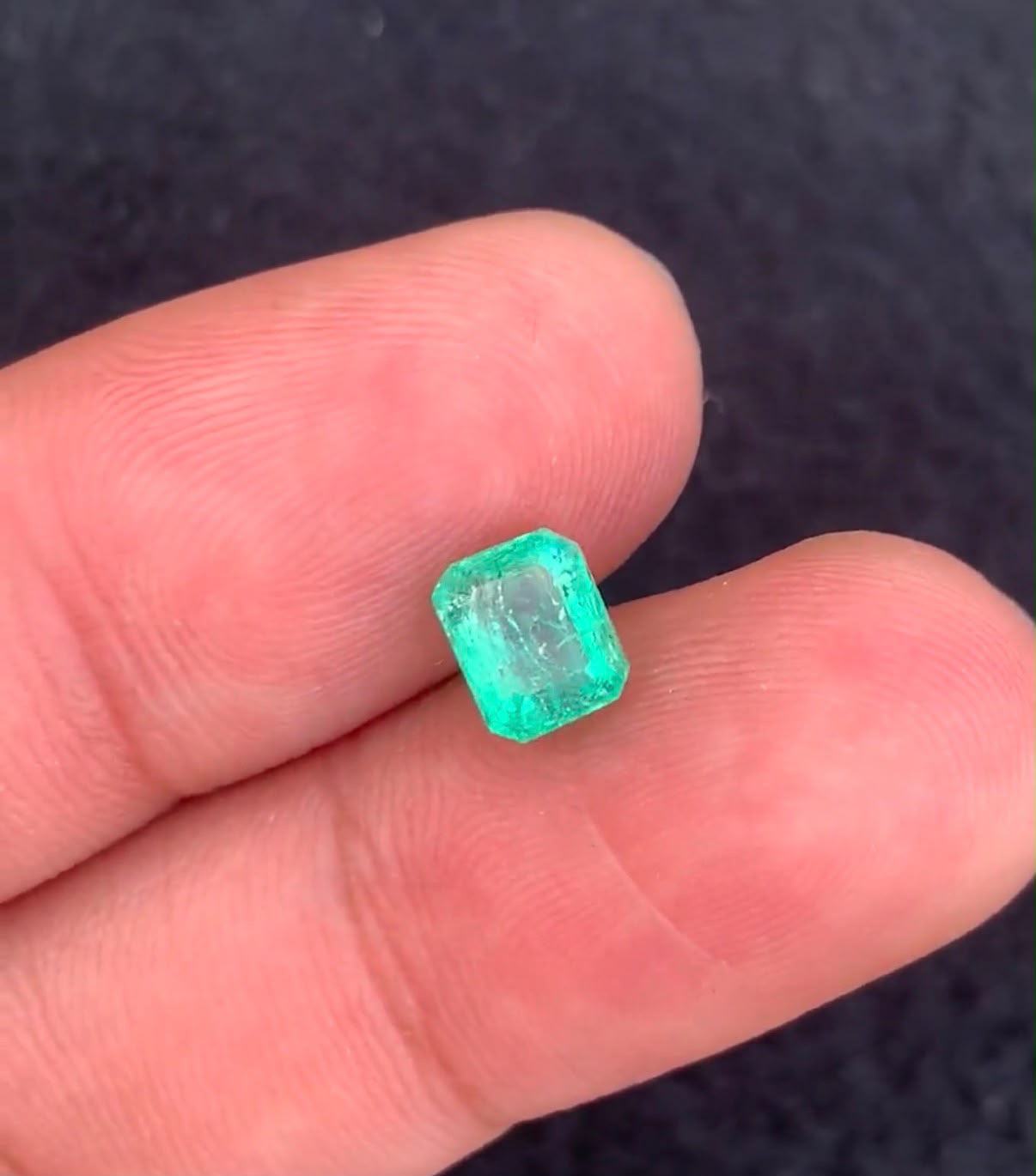 Gemstone: Natural Panjshir Emerald
Weight: 1.16 Carats
Cut: Emerald Cut
Dimensions: 6.34 × 5.06 × 4.71 mm
Origin: Panjshir Valley