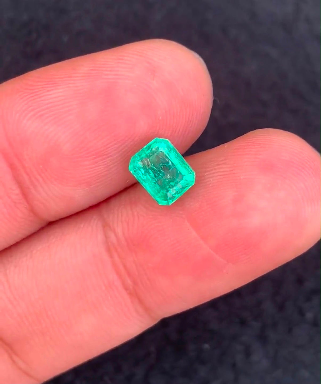Gemstone: Natural Panjshir Emerald
Weight: 1.16 Carats
Cut: Emerald Cut
Dimensions: 6.34 × 5.06 × 4.71 mm
Origin: Panjshir Valley