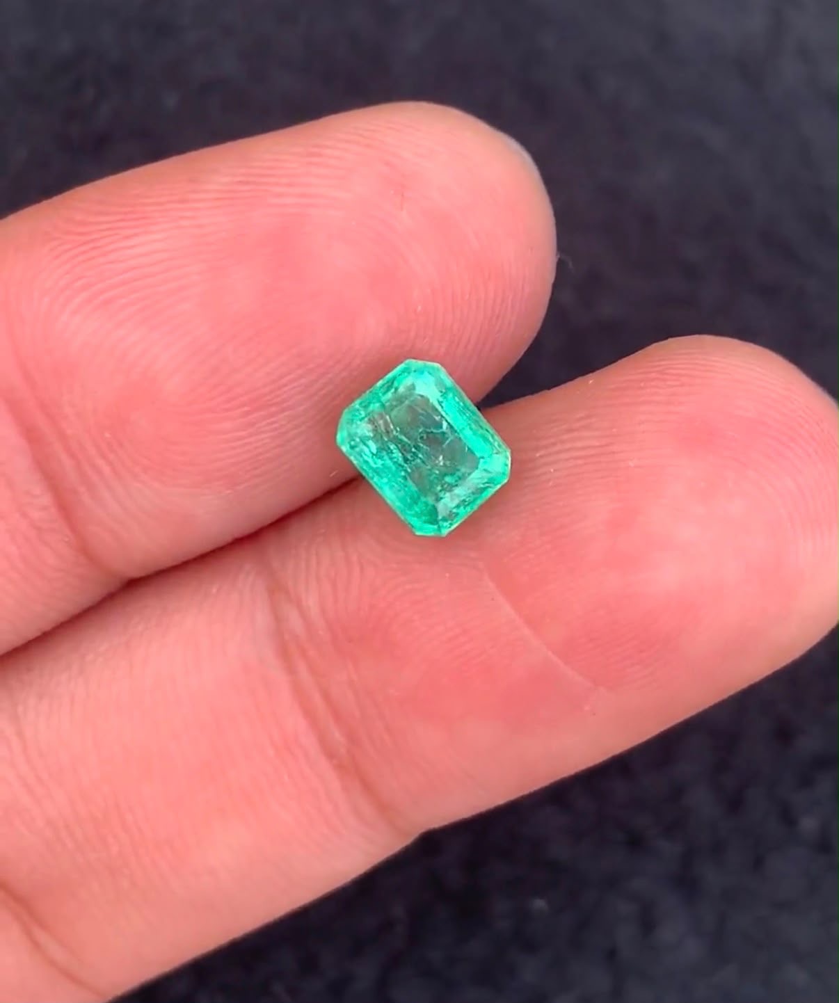 Gemstone: Natural Panjshir Emerald
Weight: 1.16 Carats
Cut: Emerald Cut
Dimensions: 6.34 × 5.06 × 4.71 mm
Origin: Panjshir Valley